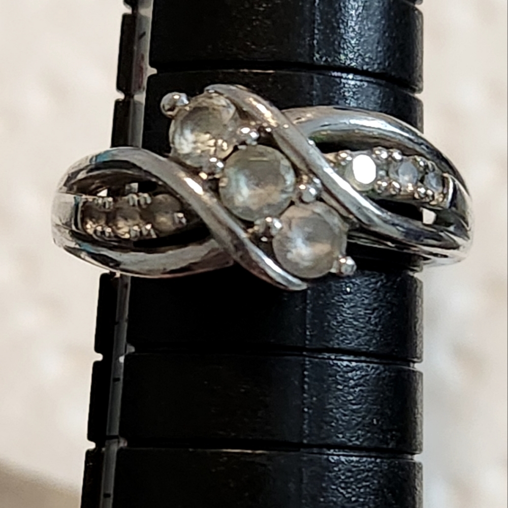 925 SS Sapphire Ring, Size 6.5. Light yellow/off- white Sapphires.